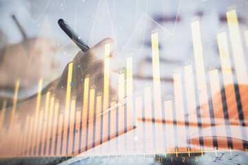 Double exposure of forex graph drawing over people taking notes background. Concept of financial...