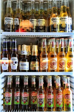Fridge with variety of beers in a bar