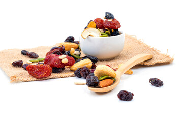 Whole grains Strawberries, Raisins, Almonds Drying On a white background cloth sack