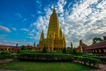Fototapeta premium The beautiful sculpture background of, Wat Bang Thong, surrounded by trees, has a large area, is a religious tourist attraction in Krabi, with tourists always visiting, Thailand