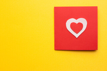 card with heart valentine holiday decoration yellow background