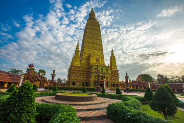 Fototapeta premium The beautiful sculpture background of, Wat Bang Thong, surrounded by trees, has a large area, is a religious tourist attraction in Krabi, with tourists always visiting, Thailand