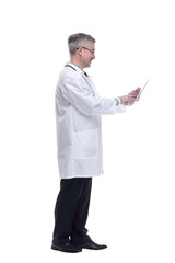 smiling doctor with a digital tablet . isolated on a white