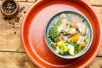 Soup with broccoli and mushrooms