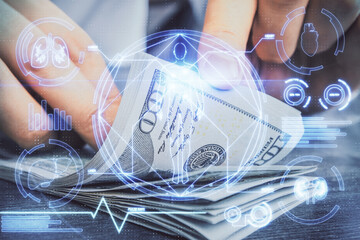 Multi exposure of education theme drawing hologram and USA dollars bills and man hands.
