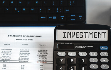 INVESTMENT - concept of text on calculator display