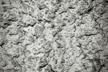 Rough stone background in black and white. 
