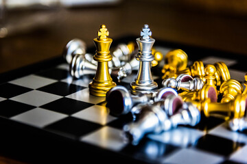Chess board game to represent the business strategy with competition in the world market. and find...