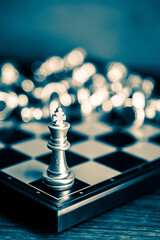 Chess board game to represent the business strategy with competition in the world market. and find out the best solution to meet target objective and goal. Sign and symbol of challenging as concept.