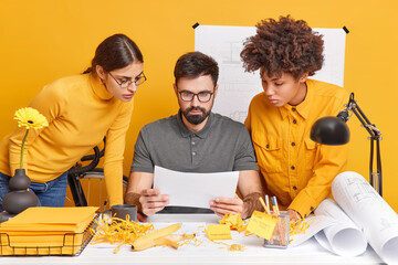 Multicultural team group collaborate together at workplace have brainstroming meeting in office...