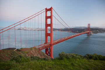 The Golden Gate Bridge in San Francisco - California - USA photographed in daylight. The cars are only visible as blurred light lines. 