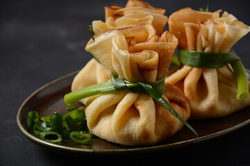 Chicken-Filled Crepe Party Purses. Pancakes rolled into a bag and stuffed with chicken meat