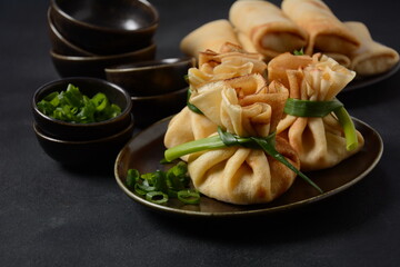 Chicken-Filled Crepe Party Purses. Pancakes rolled into a bag and stuffed with chicken meat