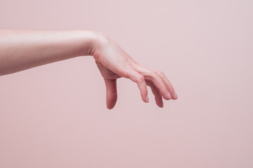 Hand gesture holding or touching something, closeup. Human hand signs communication concept