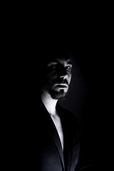 black and white portrait of a serious man