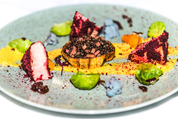 Mushroom stuffed with lentils with pork belly. The food in the restaurant. Food styling and restaurant meal serving.