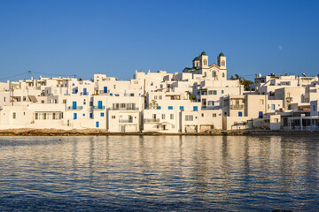 Naoussa village with traditional Greek houses in the Cycladic style, Paros island, Greece. Cyclades.