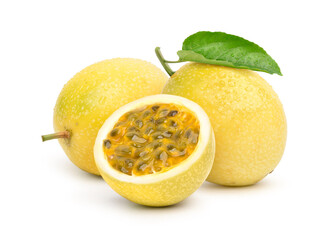 Yellow  passion fruit with cut in half and green leaf isolated on white background..