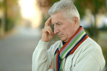  senior man thinking in park