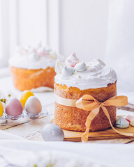 Traditional ukrainian easter cake with white swiss meringue. New cruffin cake trend 2021. Spring...