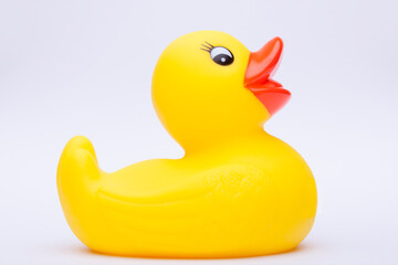 Yellow rubber duck for a kid's bath time, isolated on white background