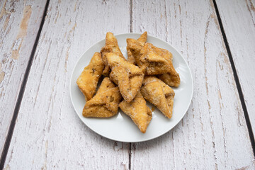 Top view of pestiños on a plate