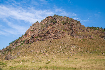 Fototapeta na wymiar Rocky hill in the Bayanaul National Park, Kazakh Uplands.