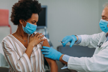 African american woman getting a vaccine