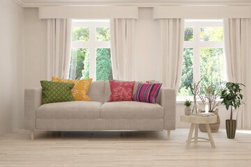 White living room with sofa and summer landscape in window. Scandinavian interior design. 3D illustration