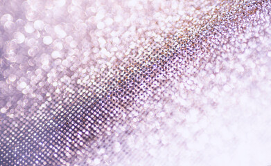 Abstract bokeh background, glitter texture. Selective focus
