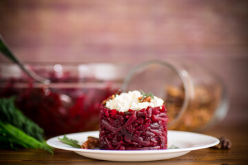 dietary salad of boiled beets with walnuts and cottage cheese