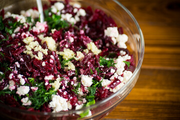 dietary salad of boiled beets with walnuts and cottage cheese