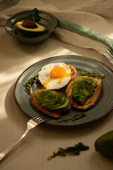 Avocado toast. Sliced bread with avocado.