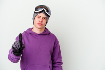 Young man holding a snowboard board isolated on white background showing number one with finger.