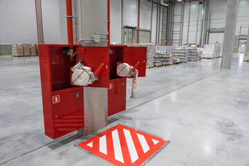 fire safety in the warehouse. new fire hydrants. red box. fire protection system for the industry.