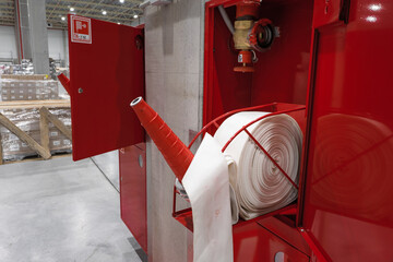 fire safety in the warehouse. new fire hydrants. red box. fire protection system for the industry.
