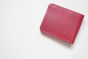 red stitched wallet men or pink blood color and cow leather for put money and card on top view white table or background isolated with copyspace