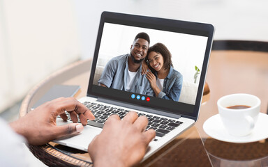 Online Communication. Unrecognizable Black Guy Having Video Call With Friends On Laptop