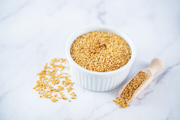 Healthy dried flax seeds in a bowl