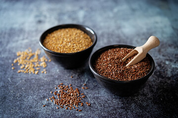 Healthy dried flax seeds in a bowl