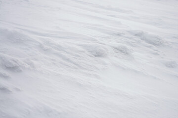 Snow surface with wind traces. Close up.