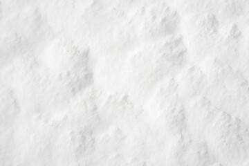 Obraz premium Fresh clean white snow background texture. Winter background with frozen snowflakes and snow mounds. Snow lumps. Seasonal landscape details. Cold weather.
