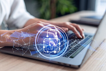 A woman programmer is typing a code on computer to protect a cyber security from hacker attacks and save clients confidential data. Padlock Hologram icons over the typing hands. Formal wear.