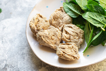 soy meat seitan vegetable protein raw pieces ready to cook snack healthy meal copy space food background rustic image vegan or vegetarian 