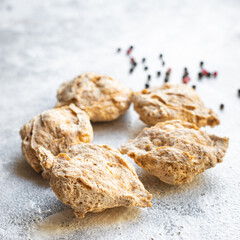 soy meat seitan vegetable protein raw pieces ready to cook snack healthy meal copy space food background rustic image vegan or vegetarian 