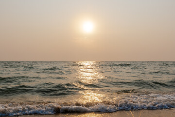 Obraz premium Sun on the air pollution sky at the beach in evening