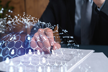 A potential employee in formal suit signing the contract to boost his career and gain new...
