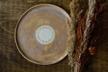 Handmade ceramic craft ware. Plate.