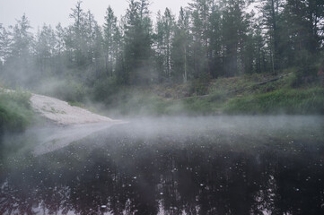 fog over the river on a summer morning