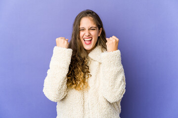 Young caucasian cute woman cheering carefree and excited. Victory concept.